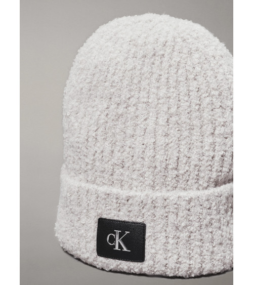 **Meta Title:** Calvin Klein Boucle Beanie - Stylish Winter Hat