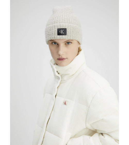 **Meta Title:** Calvin Klein Boucle Beanie - Stylish Winter Hat