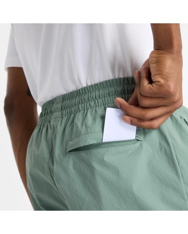 NEW BALANCE ATHLETICS STRETCH WOVEN SHORT 5 - DARK JUNIPERTG. SMALL