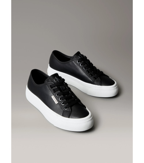 **Meta Title:** CK Women’s Black Low Top Lace-Up Sneakers